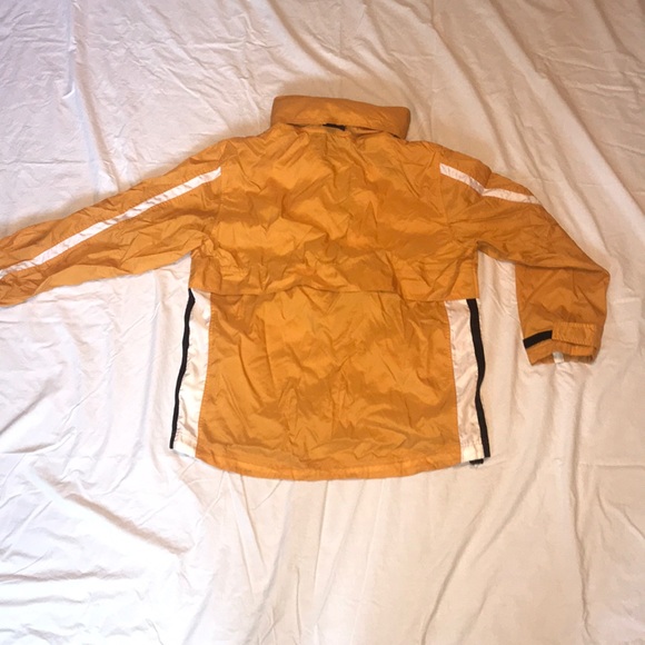 This is a yellow Nike windbreaker - Picture 4 of 5